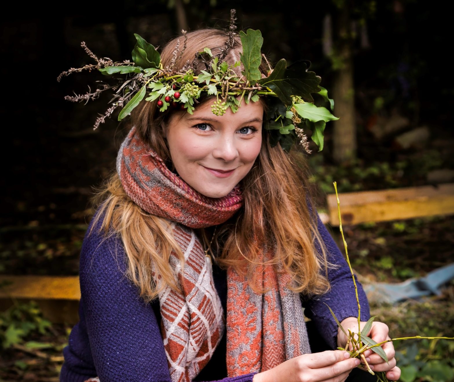 Woman with a leaf crown from a previous event.