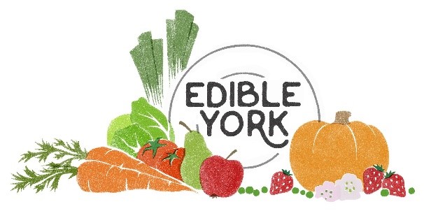 A selection of fruits and vegetables surrounding the words 'Edible York'